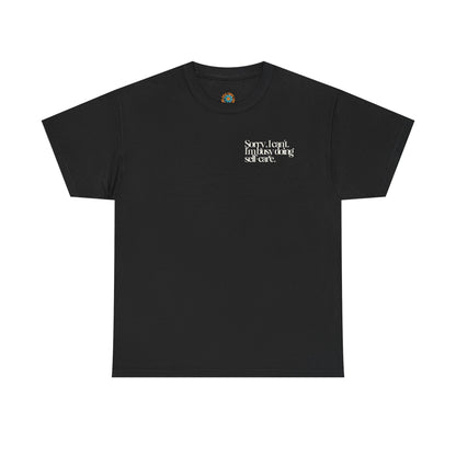 Black t-shirt with white text on a white background